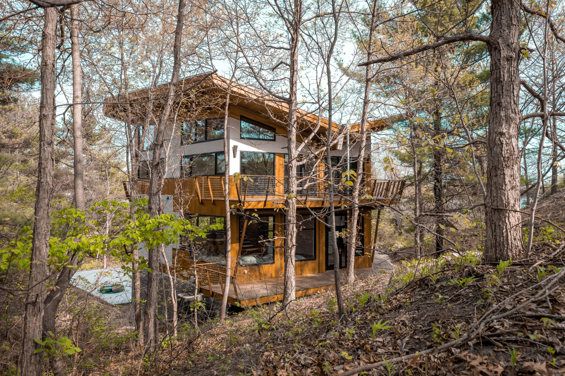 Exterior of Allegretti Architect house through the woods