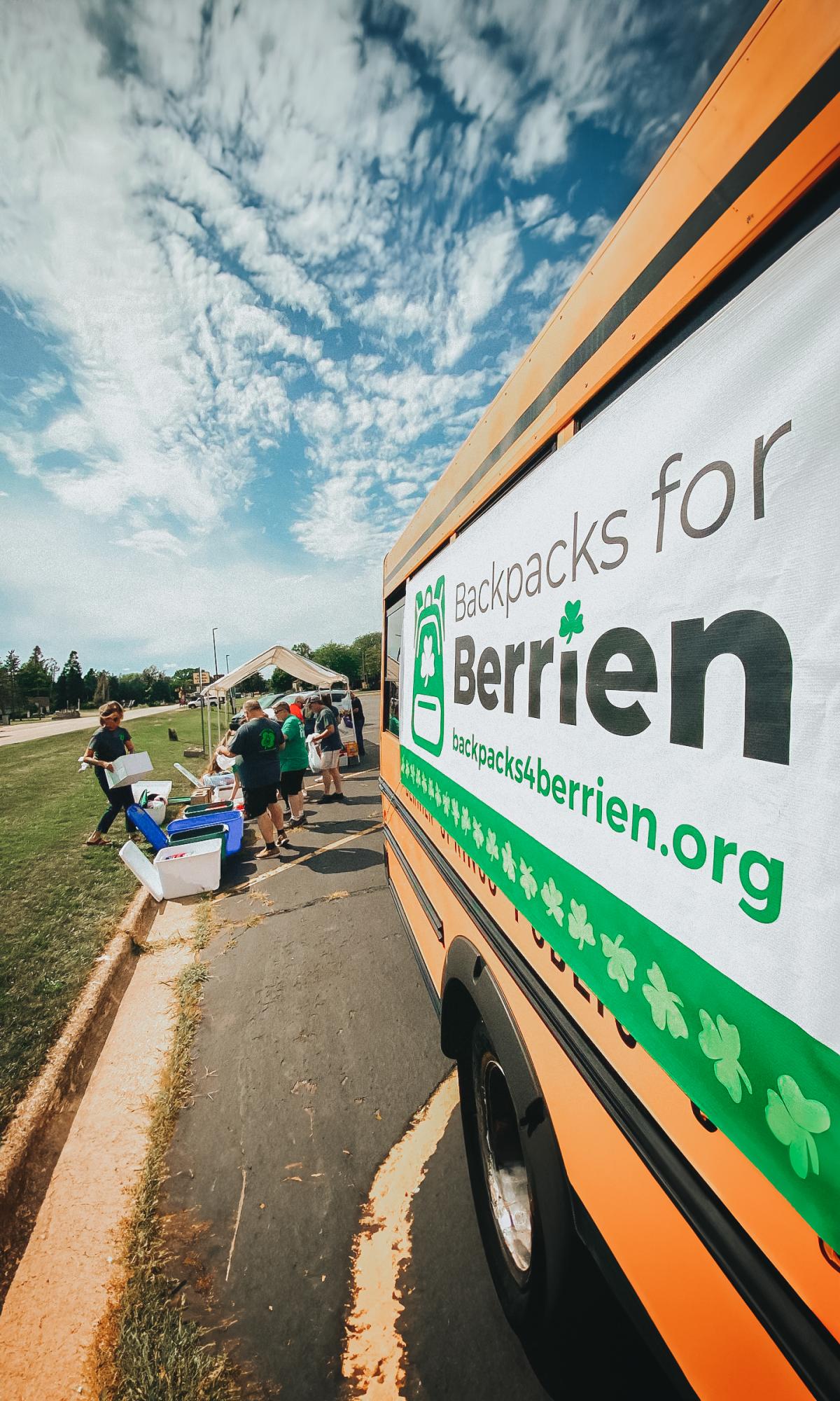 banner for Backpacks for Berrien event on a bus