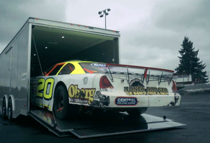 Racing car rolling out of a ACG trailer