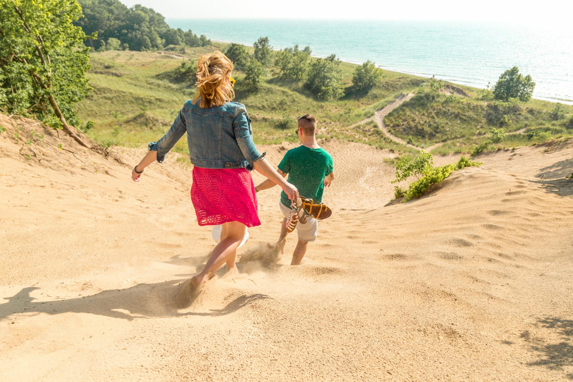climbing down a sand dune at Grand Mere State Park, Southwest Michigan