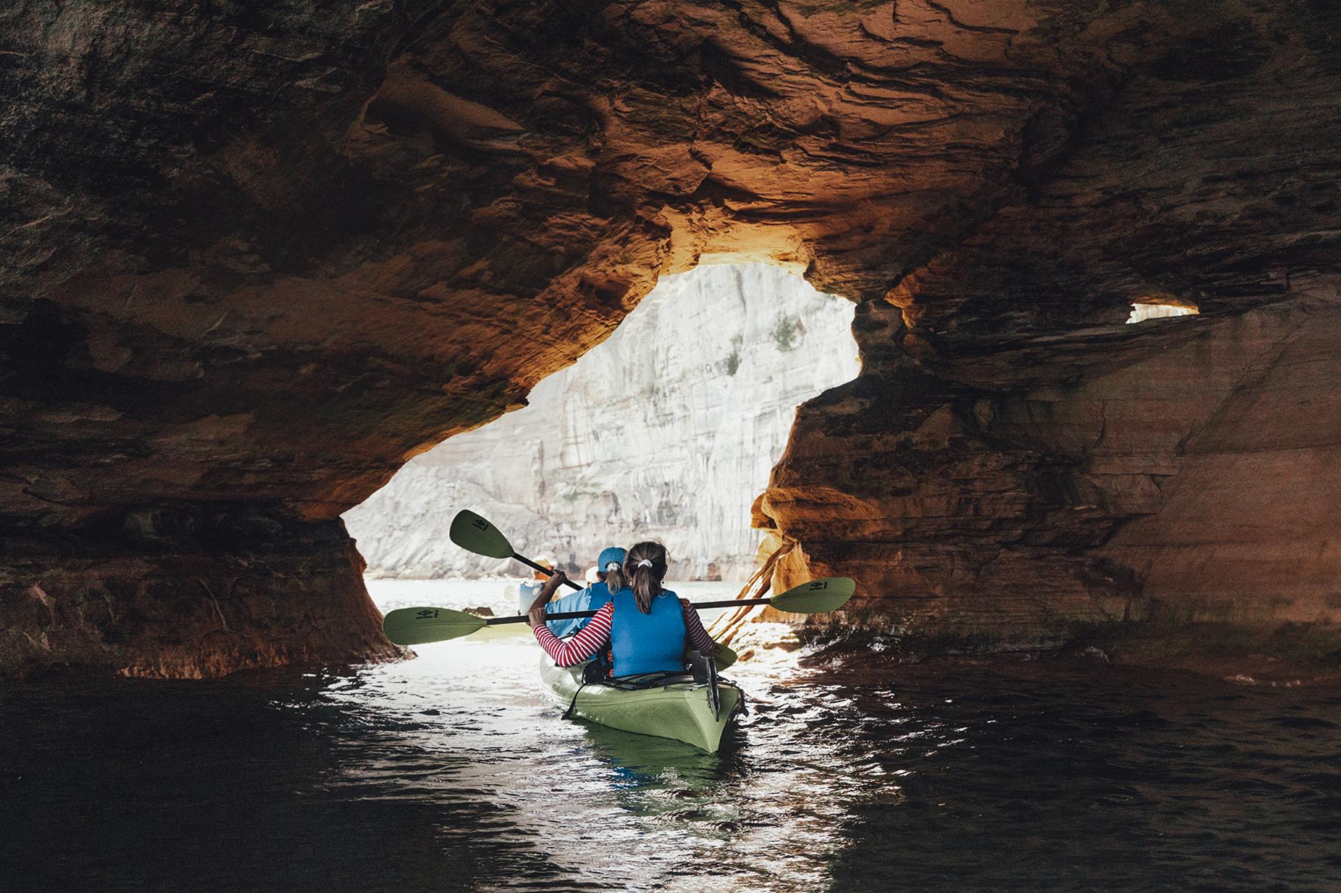 Pictured Rocks kayakers in a cavern