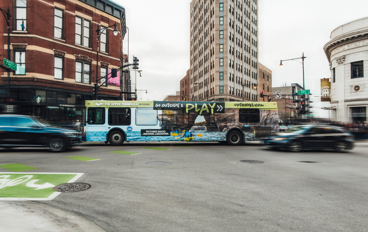 Chicago bus wrapped in image of Pictured Rocks, Upper Peninsula