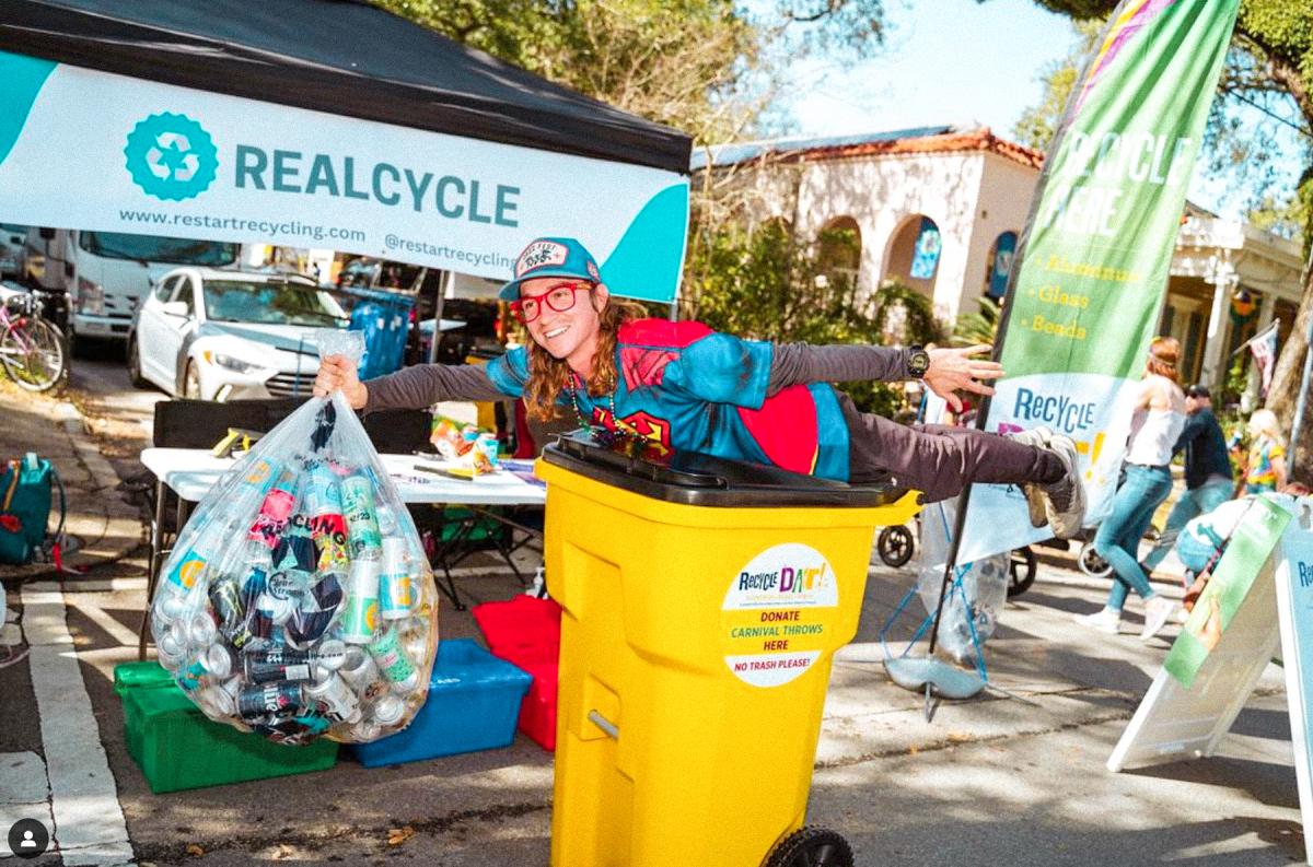 Volunteer posing at Recycle Dat Event