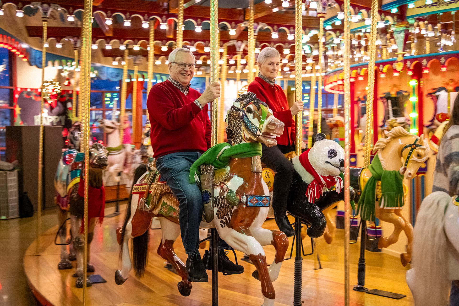 Annette and Perry on the carousel
